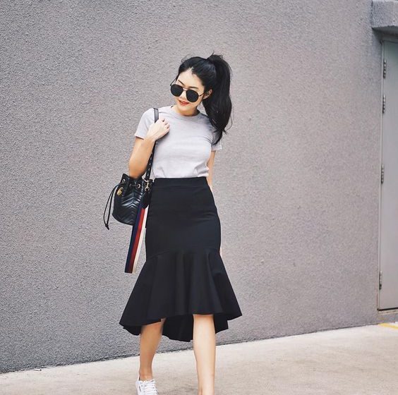 black t-shirt and peplum skirt