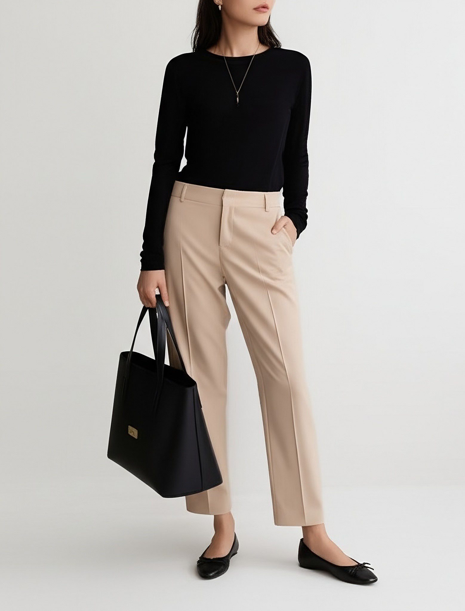 Outfit Idea 2: Solid Black Shirt + Beige Trousers